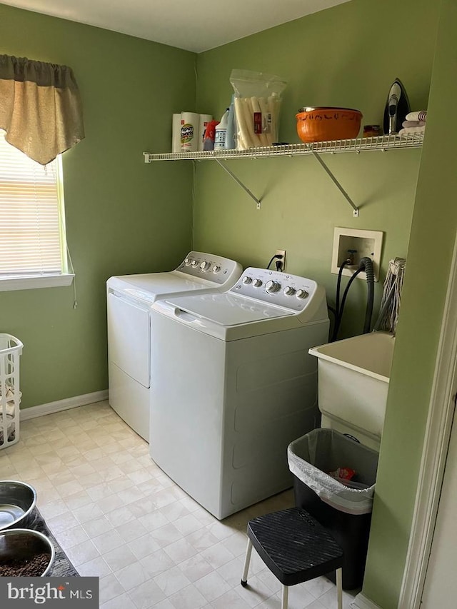 laundry area with washing machine and dryer