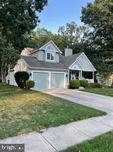 view of front facade with a front lawn