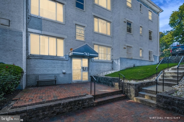 entrance to property with a patio area