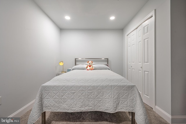 bedroom with recessed lighting, carpet floors, a closet, and baseboards