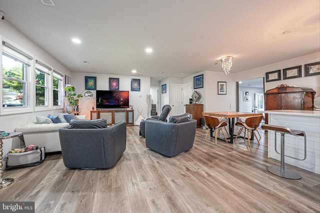 living room with light hardwood / wood-style floors