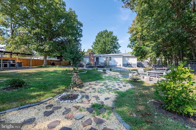 view of yard with fence