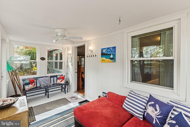 sunroom / solarium with ceiling fan