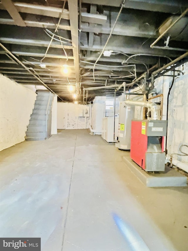 basement featuring gas water heater