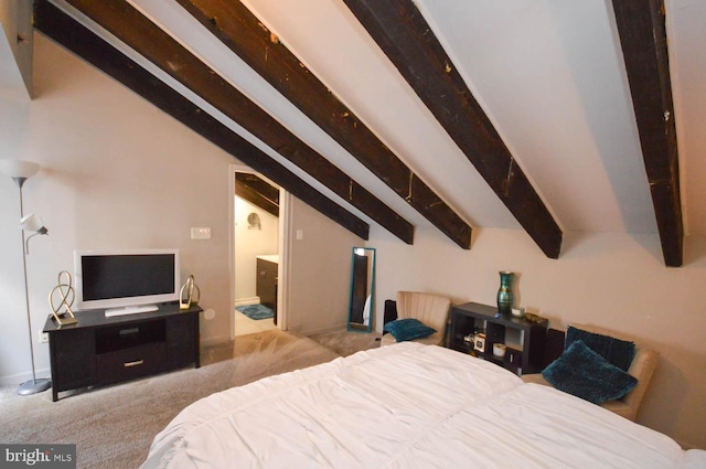 carpeted bedroom featuring lofted ceiling with beams