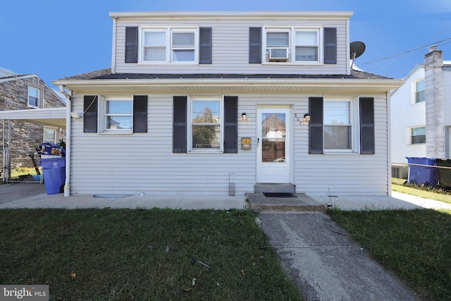 view of front of home with a front yard