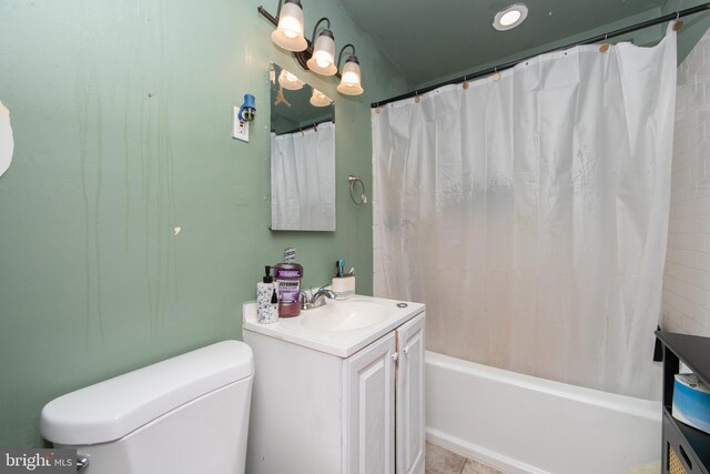 full bathroom with vanity, shower / tub combo with curtain, toilet, and tile patterned floors