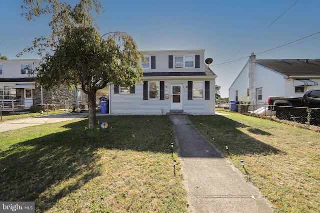 view of front facade featuring a front yard