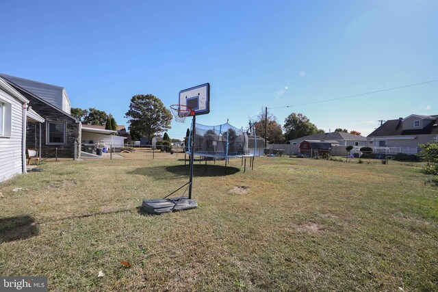 view of yard featuring a trampoline