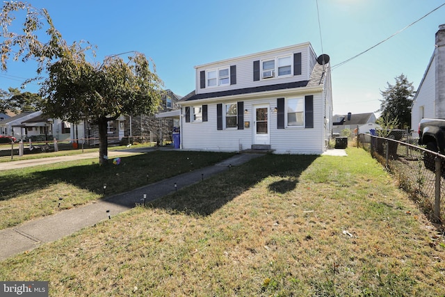 view of front of home with a front lawn