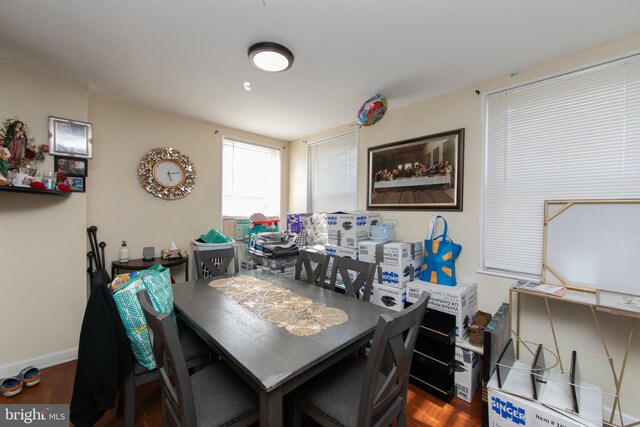 dining area featuring dark hardwood / wood-style flooring