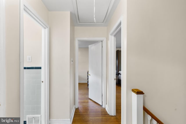 hallway with dark hardwood / wood-style floors