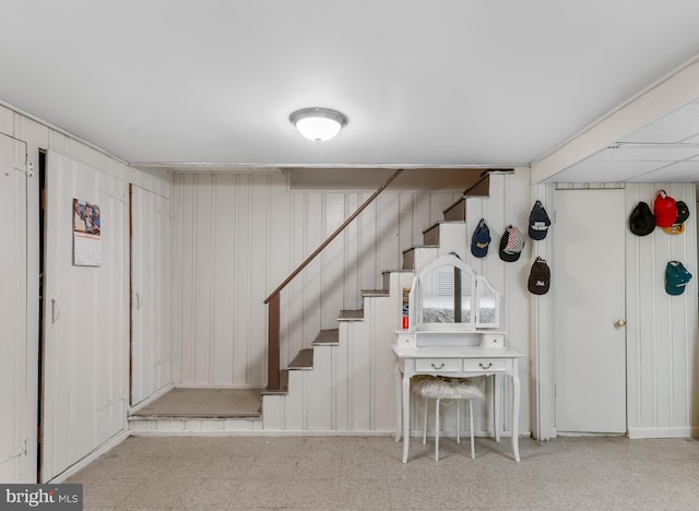 basement with wood walls