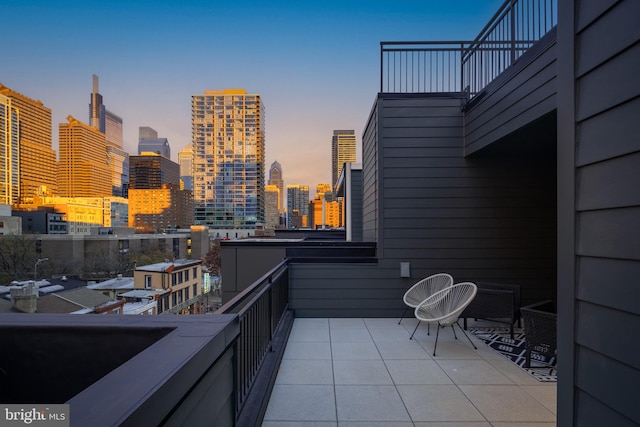 view of balcony at dusk