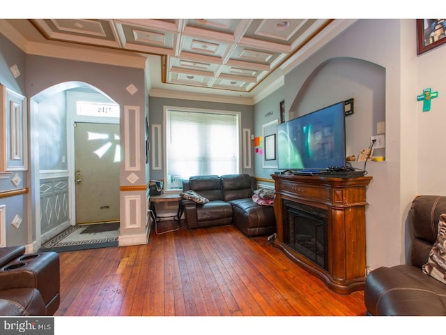 living room featuring beam ceiling, hardwood / wood-style floors, crown molding, and coffered ceiling