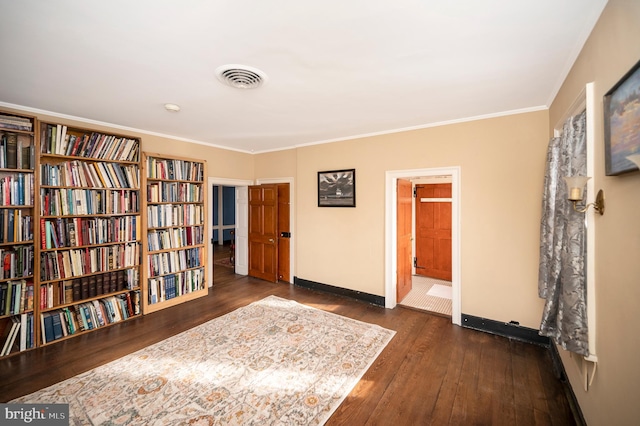 unfurnished room featuring crown molding and dark hardwood / wood-style floors