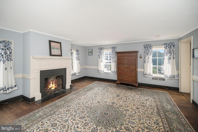 living room featuring dark wood-type flooring and crown molding