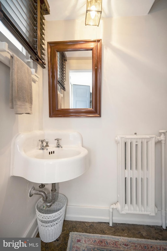 bathroom with radiator heating unit