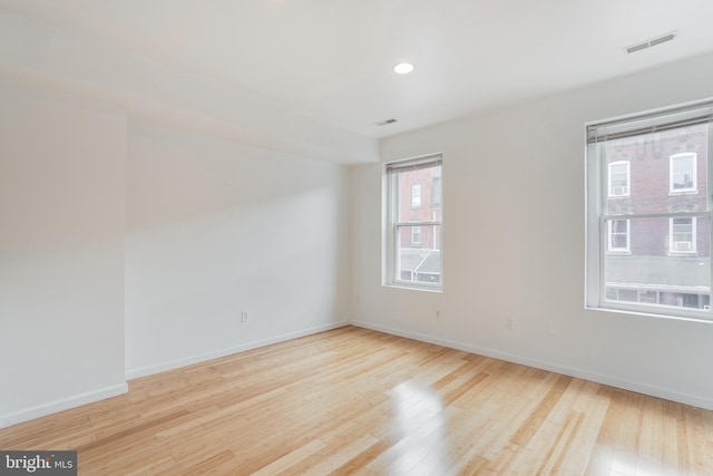 empty room featuring light hardwood / wood-style floors