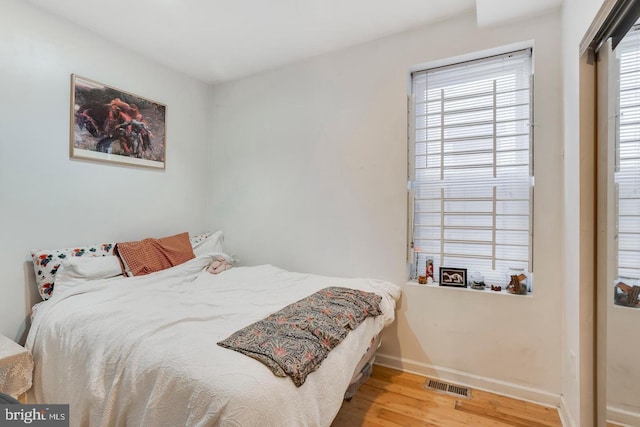 bedroom featuring hardwood / wood-style floors