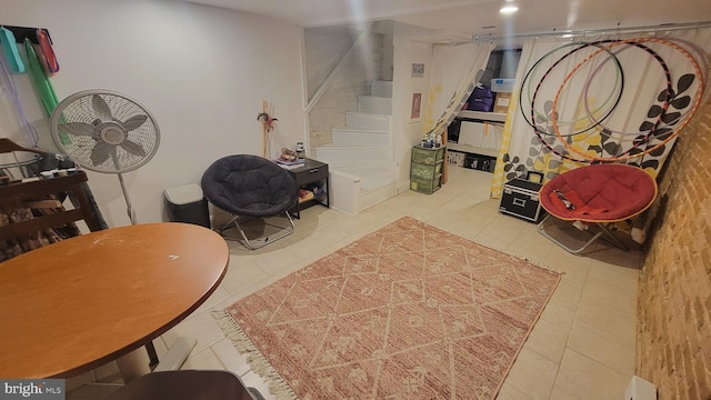 basement with tile patterned floors