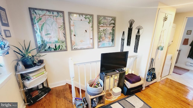 interior space with hardwood / wood-style floors