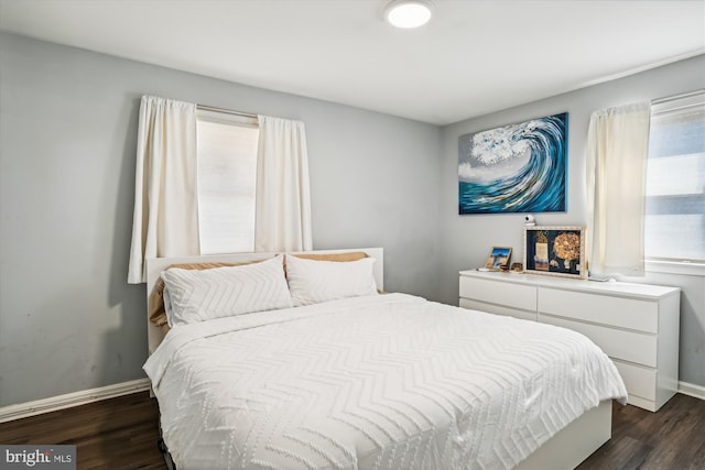 bedroom featuring dark hardwood / wood-style floors