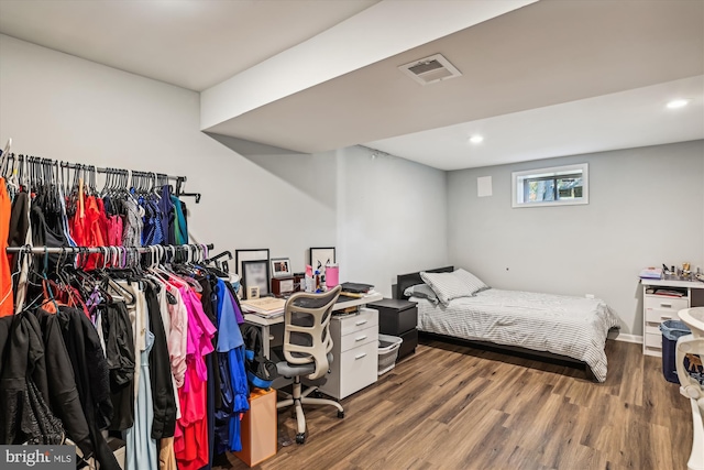 bedroom with wood-type flooring