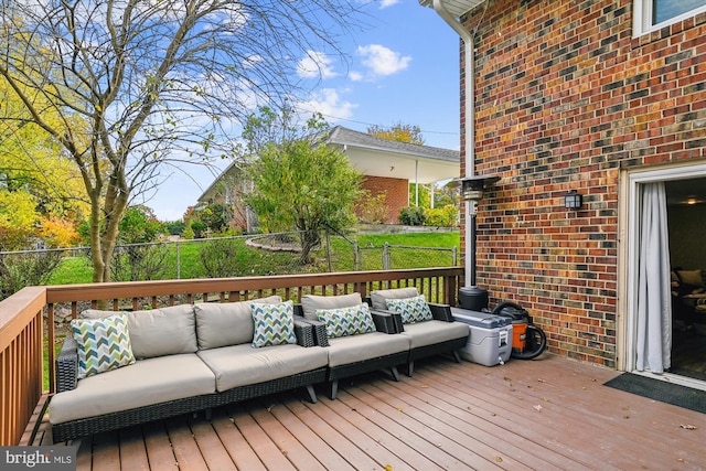 wooden deck featuring an outdoor hangout area