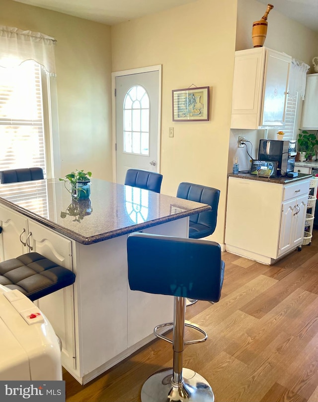 dining space with light wood-type flooring