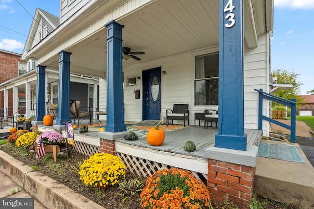 exterior space with a porch and ceiling fan