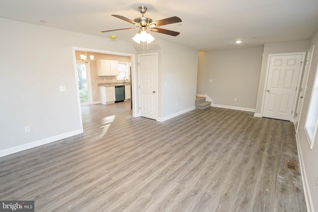 unfurnished living room featuring light wood-type flooring and ceiling fan