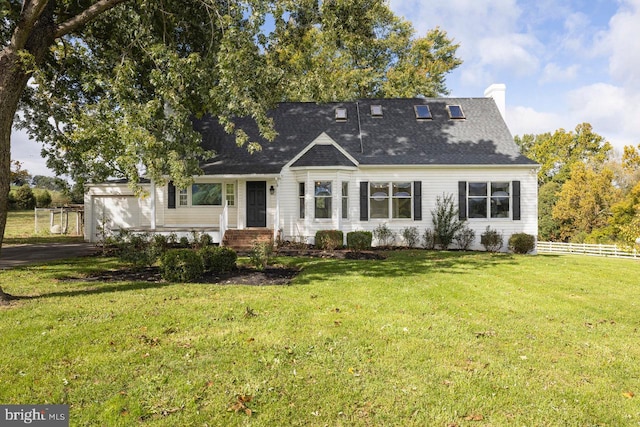 cape cod-style house featuring a front lawn