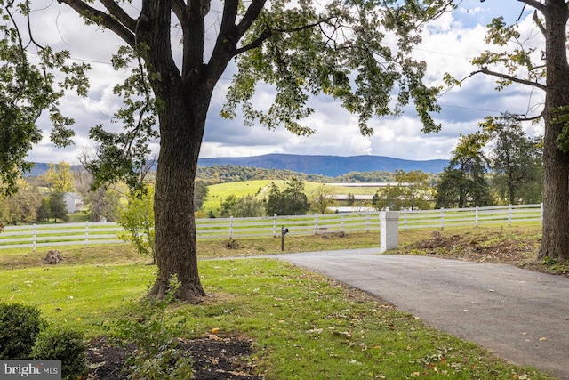 exterior space featuring a mountain view and a rural view