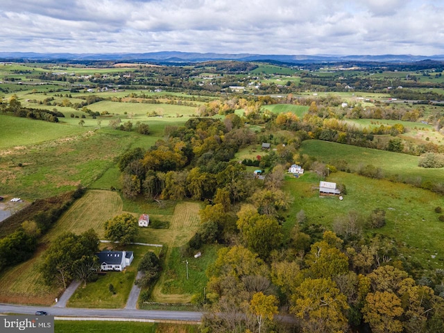 bird's eye view featuring a mountain view and a rural view