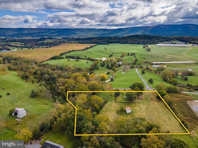 bird's eye view featuring a mountain view and a rural view