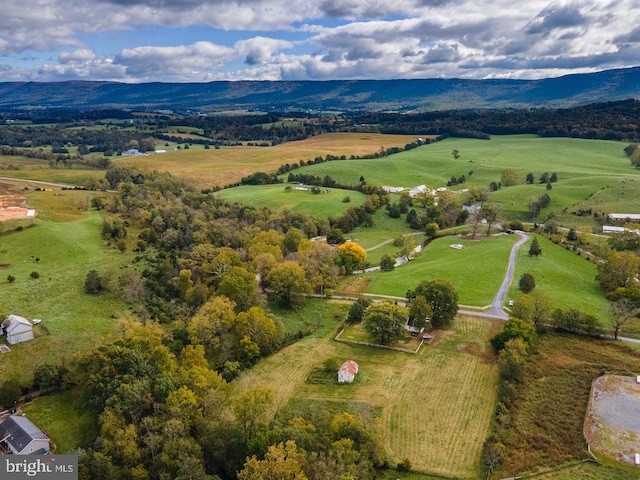 bird's eye view with a mountain view and a rural view