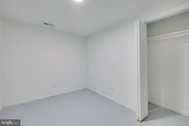 unfurnished bedroom with a closet