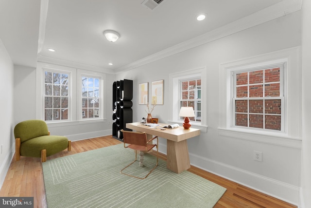 office area featuring ornamental molding and hardwood / wood-style floors