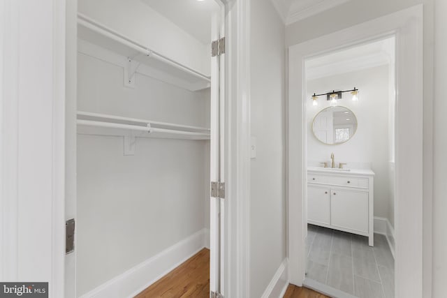 bathroom with vanity and hardwood / wood-style floors