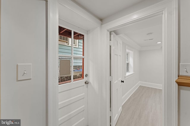 doorway to outside with light hardwood / wood-style flooring