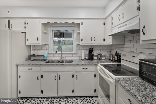 kitchen with white cabinets, white appliances, sink, and exhaust hood