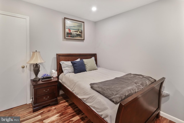 bedroom featuring hardwood / wood-style floors