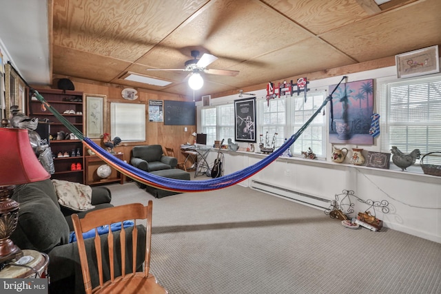 rec room with carpet, plenty of natural light, and ceiling fan