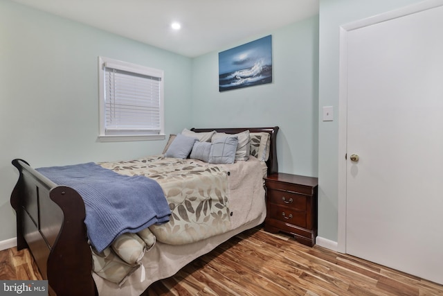 bedroom featuring hardwood / wood-style flooring