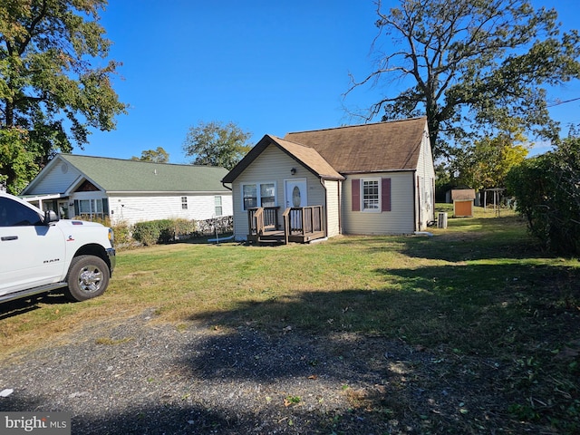 exterior space featuring a shed and a front lawn