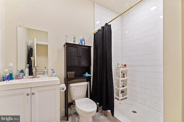 bathroom featuring vanity, toilet, a shower with curtain, and tile patterned flooring