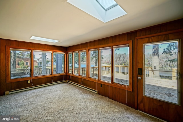 unfurnished sunroom featuring baseboard heating