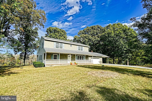 view of front of property featuring a front yard and a porch