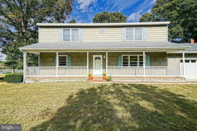 farmhouse-style home featuring a porch, a front lawn, and a garage